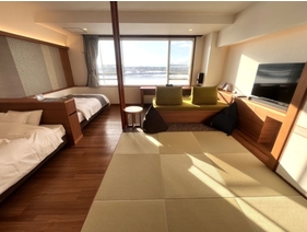 【シンクロツイン】十勝川の四季の風景をお楽しみいただけるシンクロツインルームは頭合わせのベッド配置